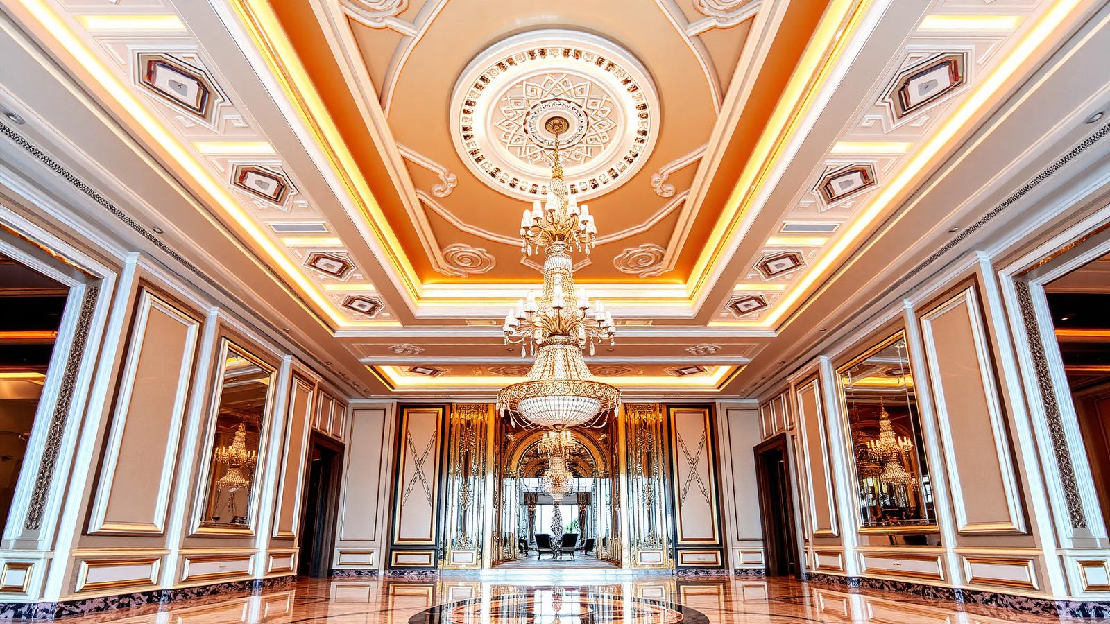 Luxury interior with an elegant POP ceiling featuring decorative moldings, geometric patterns and premium integrated lighting